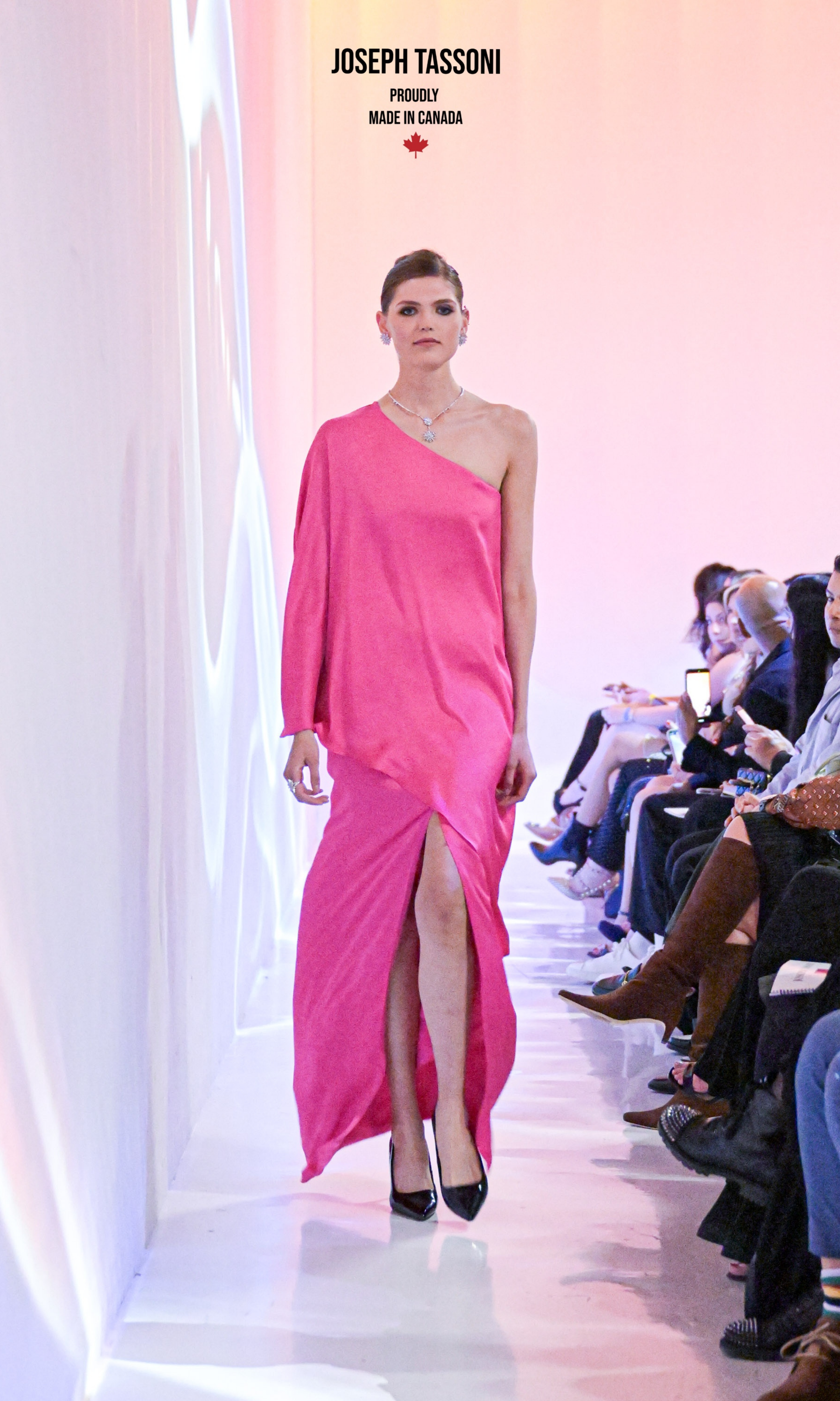 Make a dramatic entrance with the Joseph Tassoni Asymmetic Off-the-Shoulder Red Carpet Gown